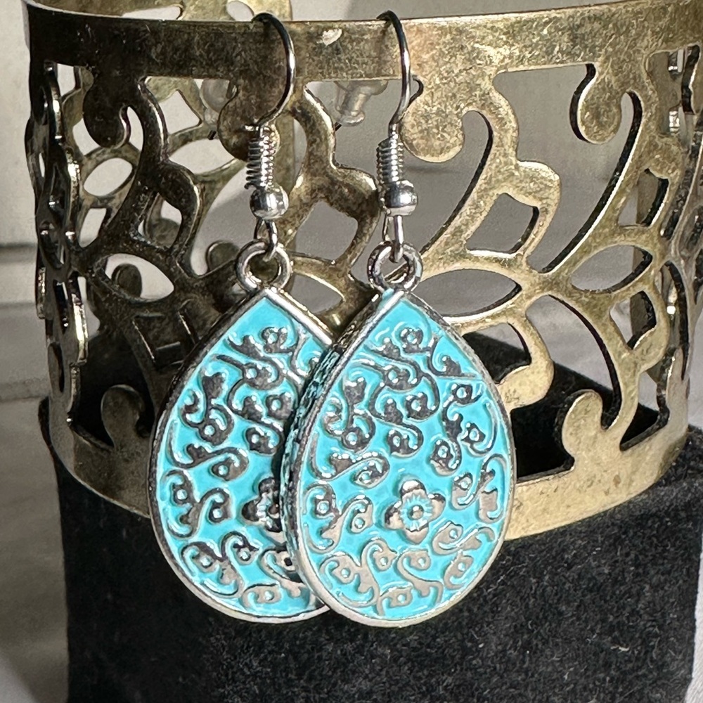 Teal blue tear drop style silvertone earrings